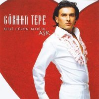 Постер песни Gökhan Tepe - Belki Hüzün Belki De Aşk